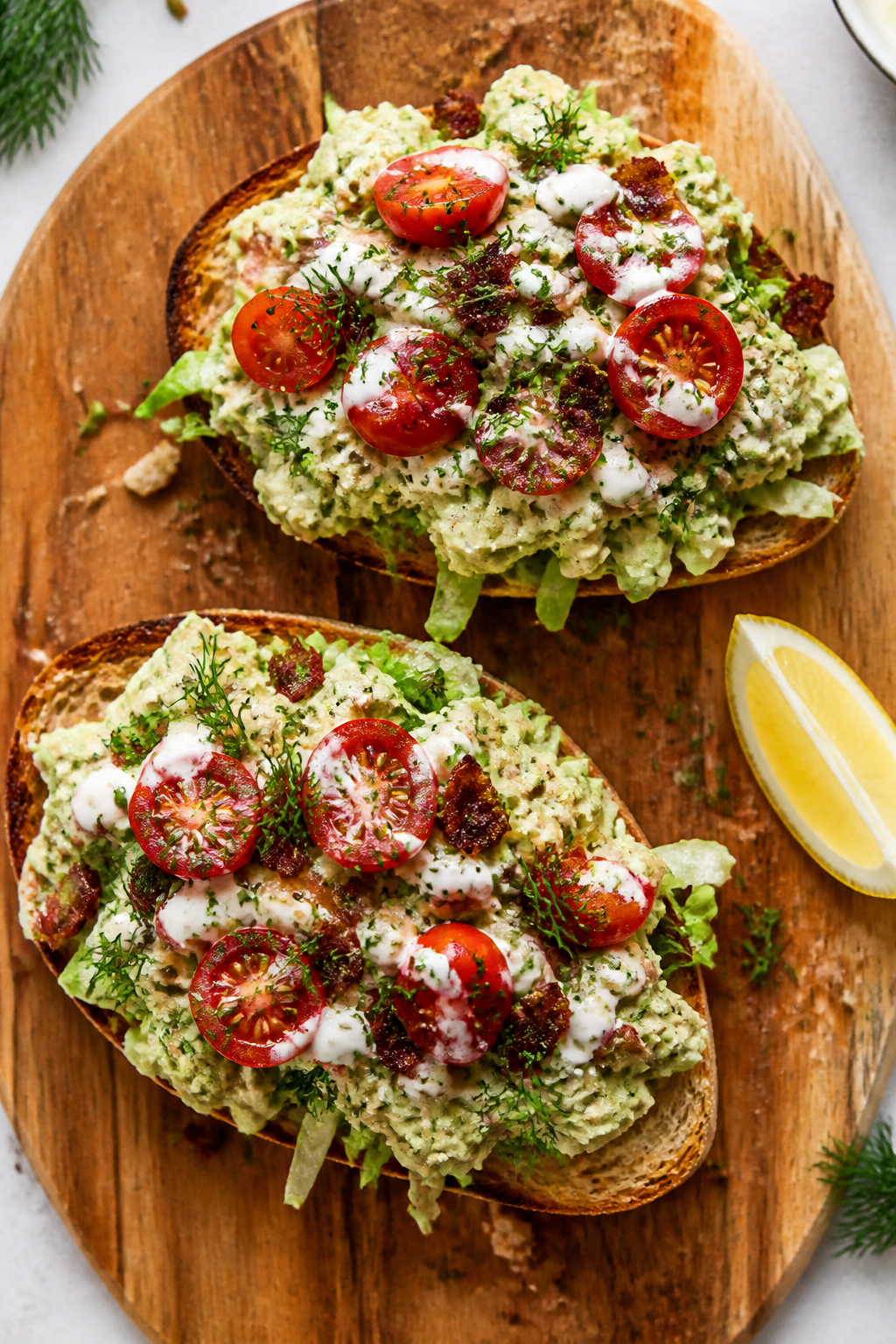 Tasty top view: Overhead shot of the final Avocado Ranch Chicken Salad served BLT-style on toasted s