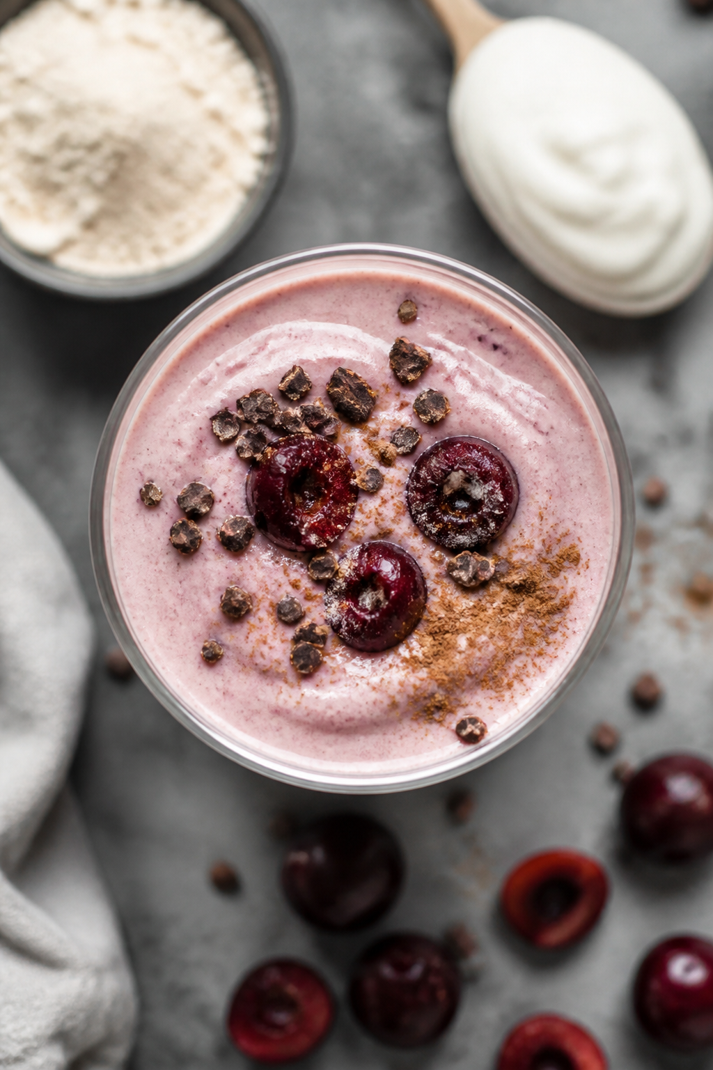 Tasty top view: Overhead shot of the finished Cherry Vanilla Protein Smoothie in a clear tumbler, cr